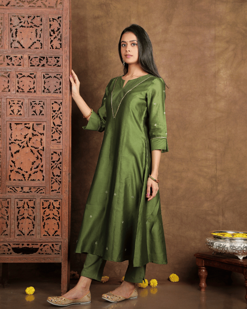 Fida A line Chanderi Silk Kurta and Pant Set with a v shaped yoke  and kalis in Moss Green-S