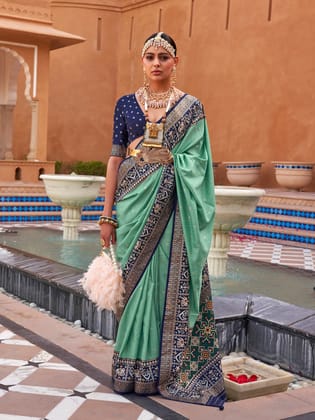 Sea Green Woven Designed Patola Silk Saree