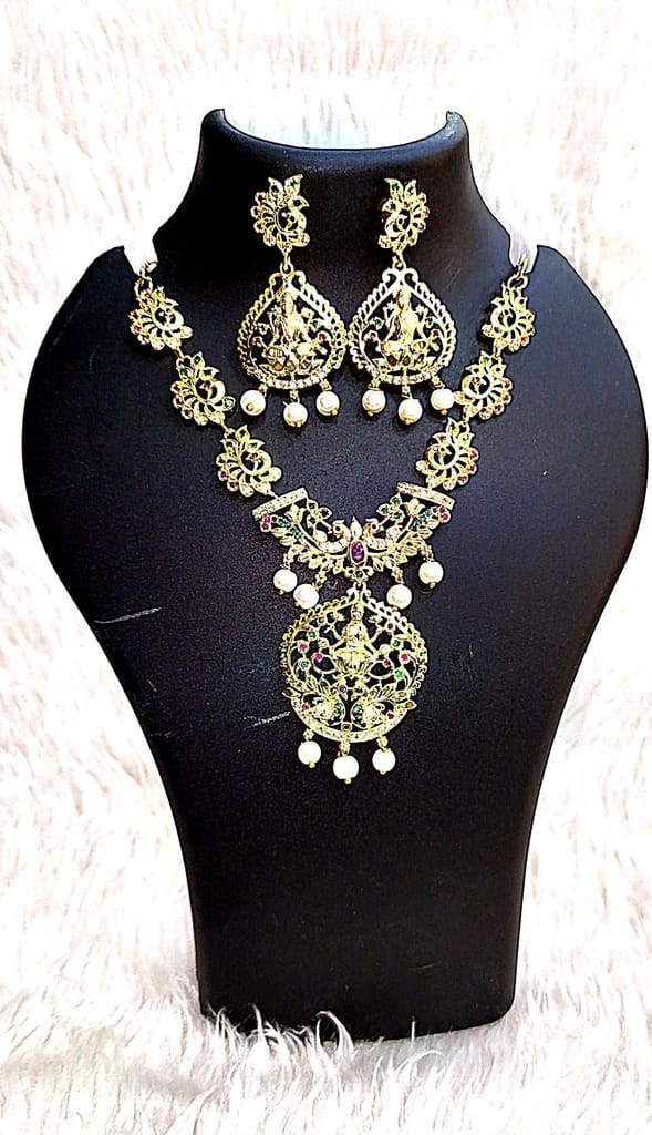 Gold-plated, pearl, and green stone necklace set