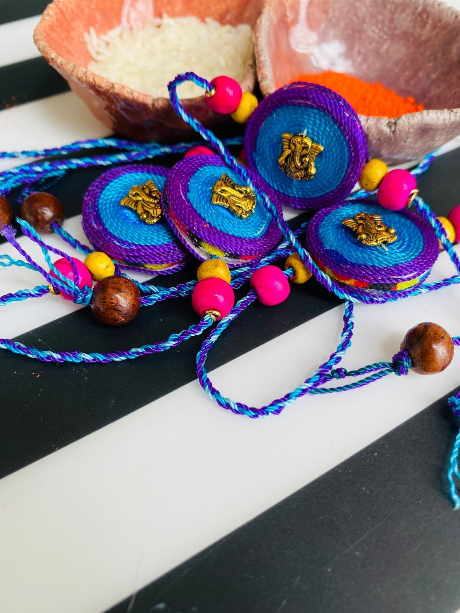 Peacock Hues Ganesha Rakhi - 1 piece