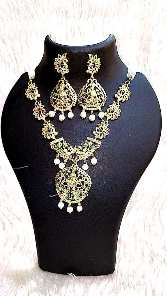 Gold-plated, pearl, and green stone necklace set