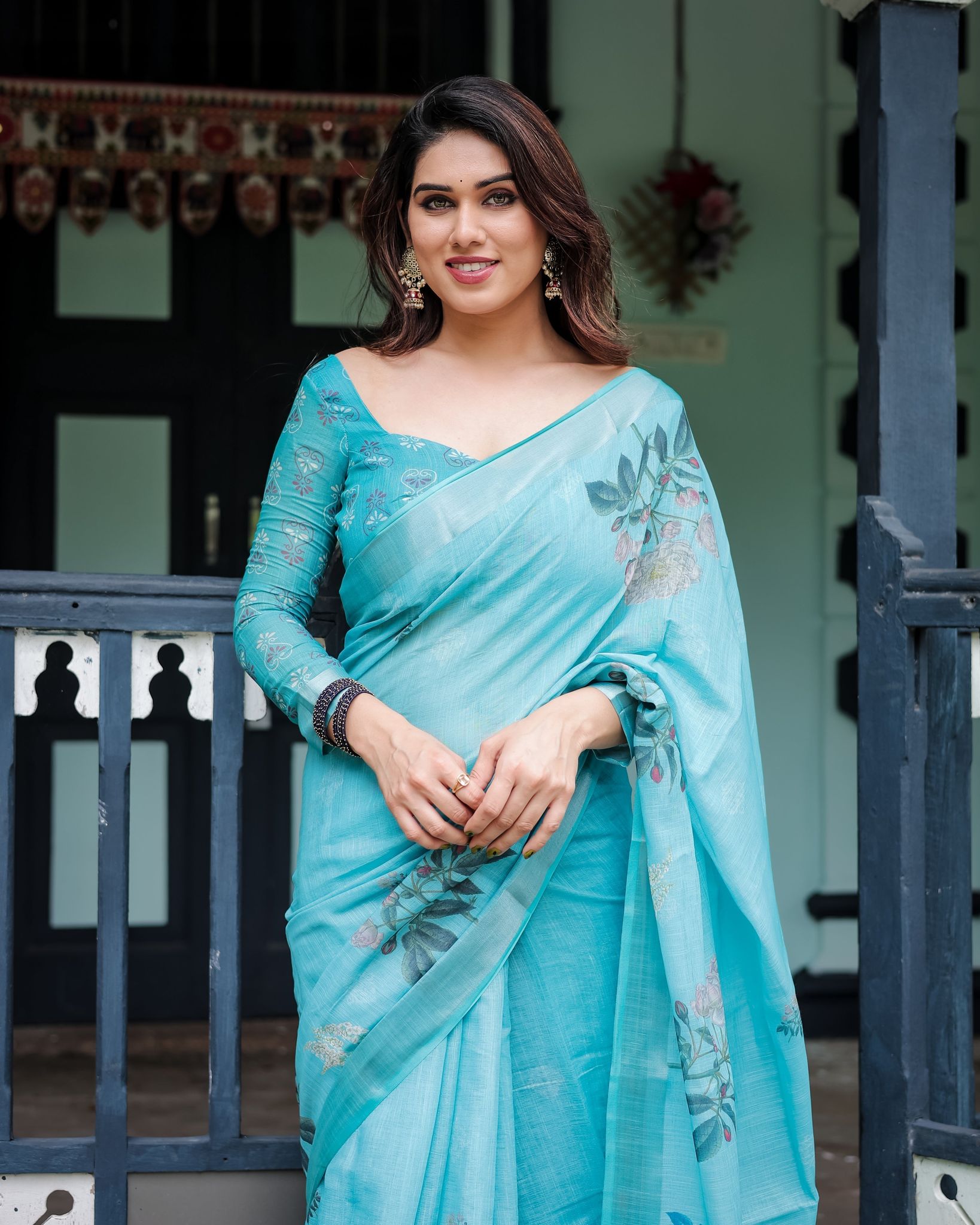 Aqua Blue Pure Cotton Linen Saree with Floral Design, Blouse, and Tassel Detailing-Regular