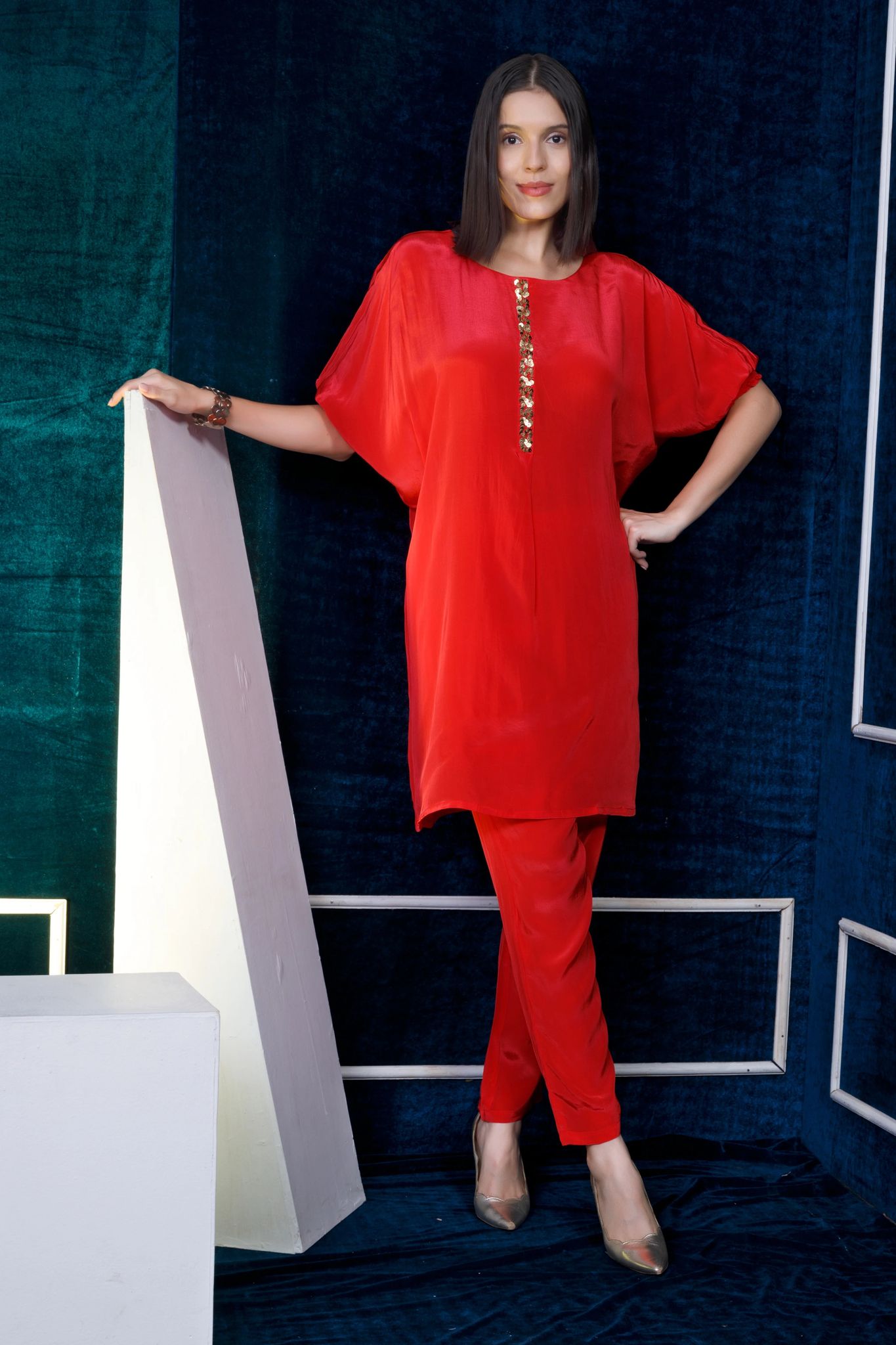 Coral crepe kurta with gold embroidery on kurta Patti  teamed with straight pants-M