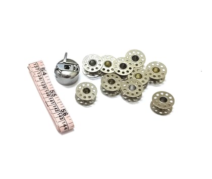 Nawani Pack of 10 Metal bobbins for Sewing Machine and 1 Bobbin and 1 Inch Tape.