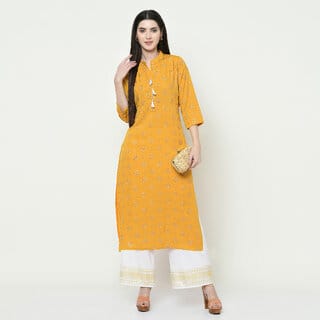 SVB Yellow Colour Party Wear Foil Print Kurtis With Plazzo