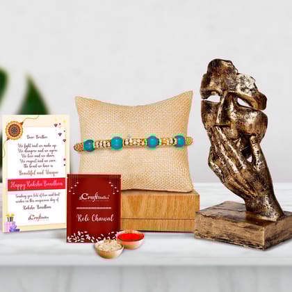 Designer Pearl Rakhi with Handcrafted Polyresin Face Showpiece and Roli Chawal Pack, Best Wishes Greeting Card