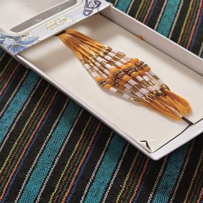 Premium Golden Yellow Rakhi for Festive Celebrations