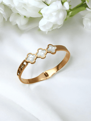 Gold Bracelet with White Flowers.