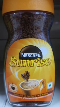 Nescafe sunrise instant coffee powder jar