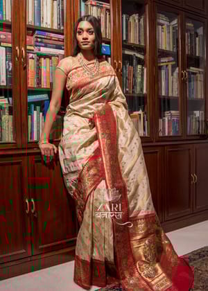 Nazakat: Banarasi Silk Saree In The Shades Of White And Red With Leheriya Zari Pattern And Mughal Butas