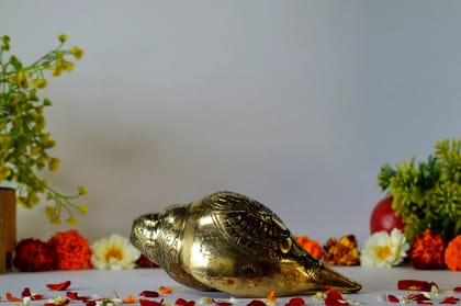 Brass Shankh with Vishnu Carving (Color - Golden, Size - 3.5H *6.5L*3.5B) by Snova Enterprises Brass Shankh with Vishnu Carving (Color - Golden, Size - 3.5H *6.5L*3.5B) by Snova Enterprises