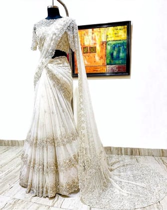 Luxurious White Net Lehenga Saree with Blouse  by SHIV TEXTILES