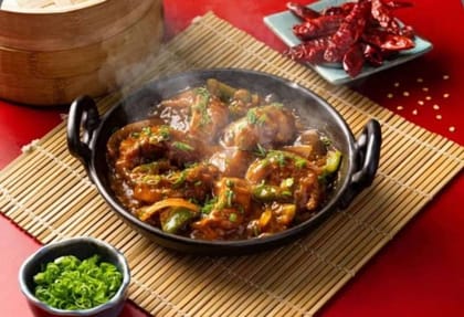 Chicken Momos In Chilly Sauce