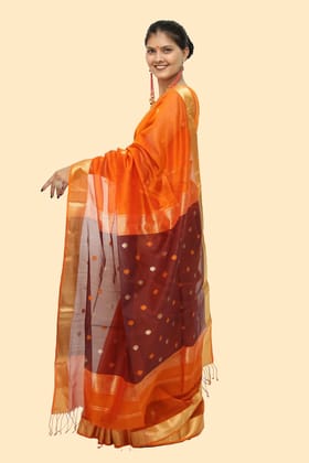 Vibrant Orange Drop motif handloom Saree with Tassels Vibrant Orange Drop motif handloom Saree with Tassels