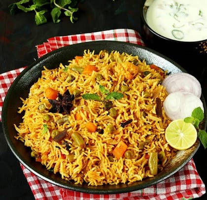 Veg. Biryani (With Raita)