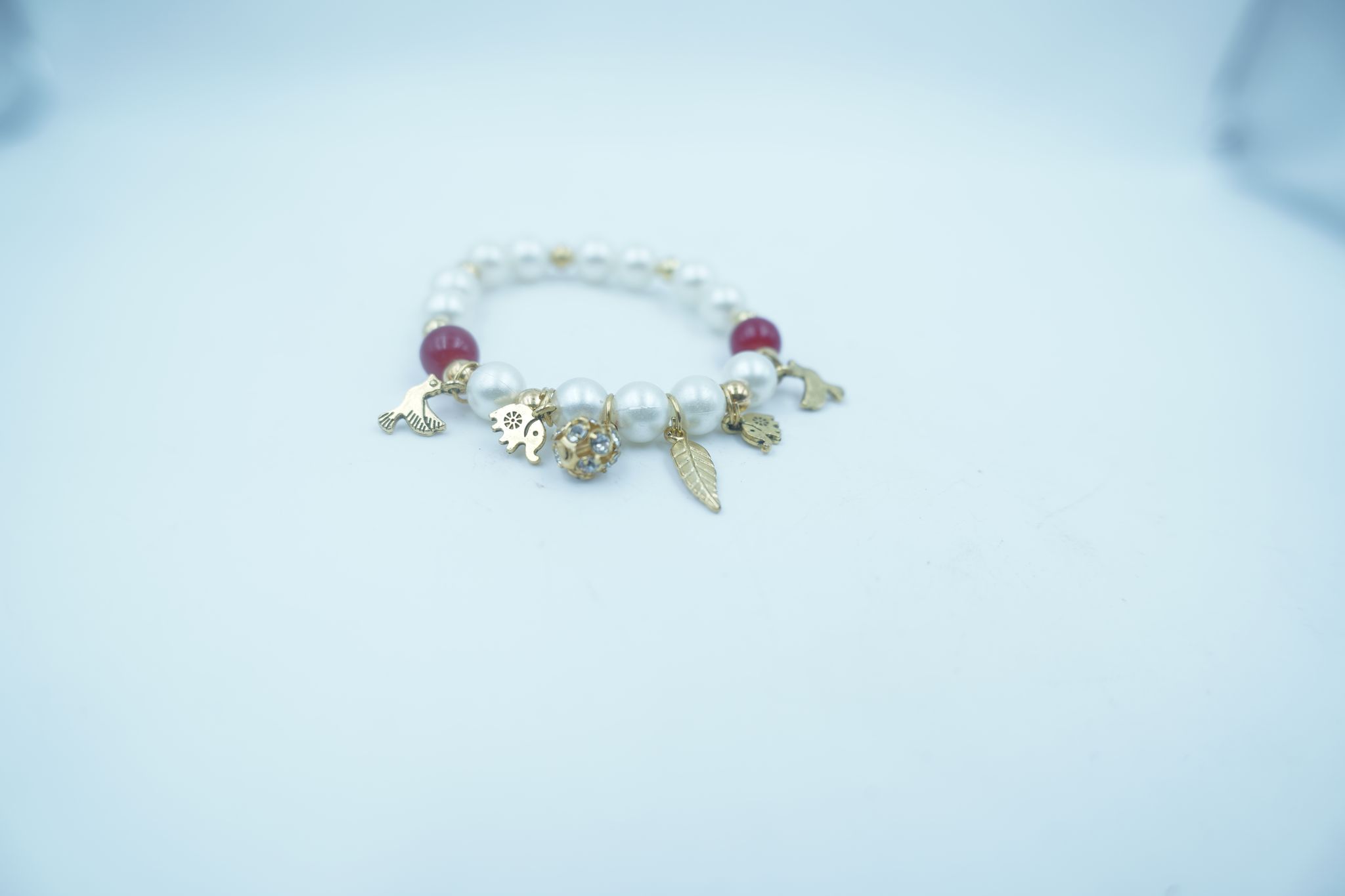 Regal Pearl Charm Bracelet