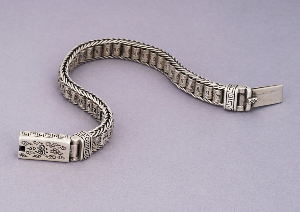 Revolving Om Barrel Bracelet