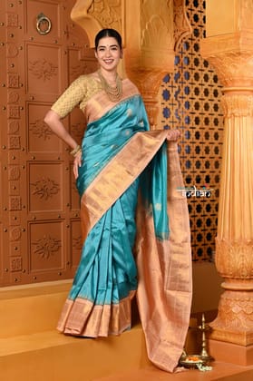Shubh ~ Gadwal Pure Silk Handloom Saree in Metallic Blue with Golden Border