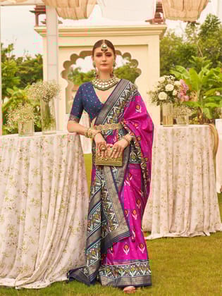 Pink Printed Patola Silk Saree with contrast border and blouse