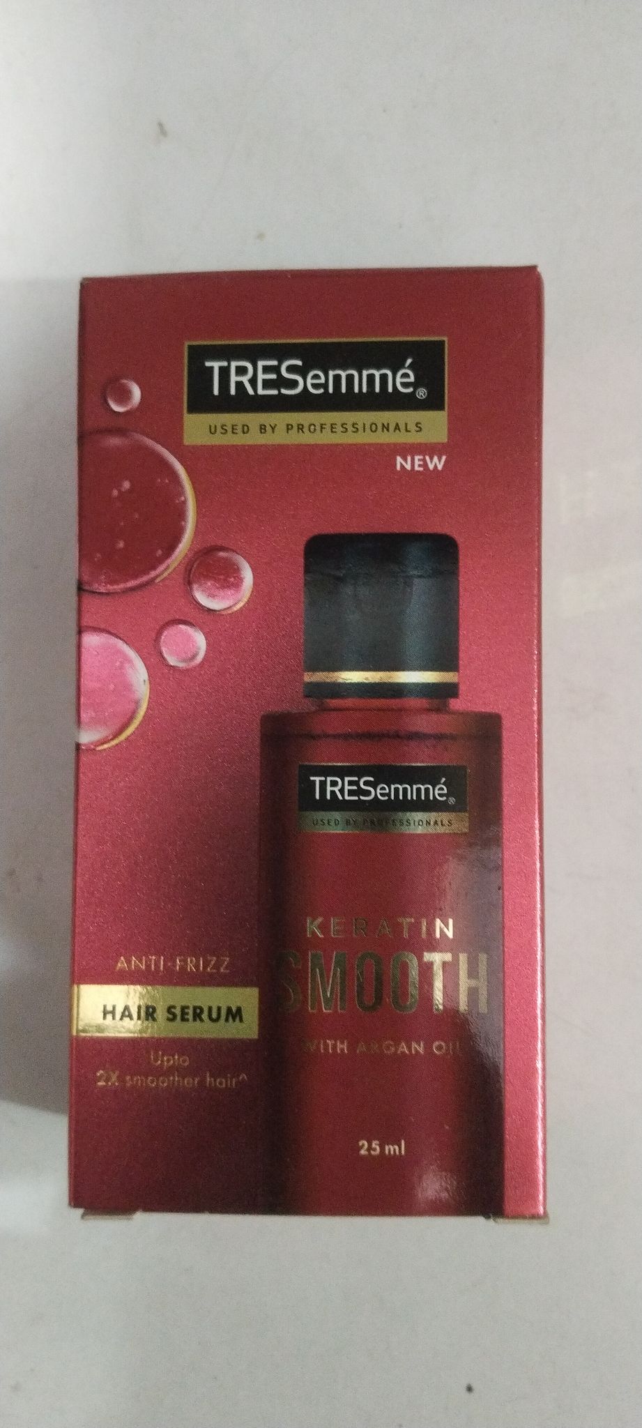 Tresemmé. Anti-frizz Hair serum 