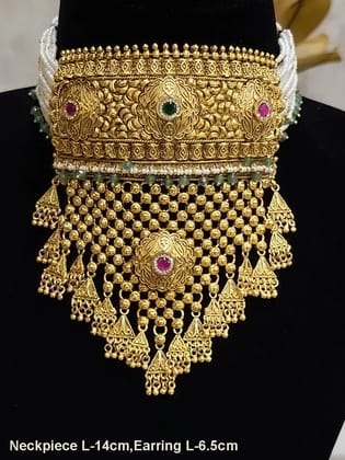 Ruby and green stones studded self flower design rajputi choker with jade bead hangings(with maangtika)