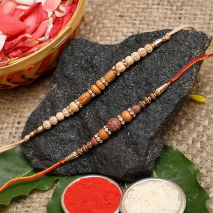 eCraftIndia Set of 2 Multicolor Designer Rakhis with Roli Chawal Pack