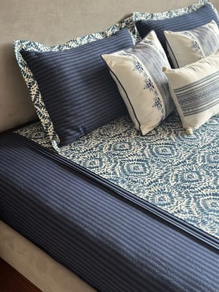 KRI India The Minimalist Tie Dye Stripes Bedsheet Set | Indigo Blue with navy blue stripes side panels | 102x102 inches | Wash & Care | 100% Cotton | Handcrafted in India. 100% organic & natural. KRI India The Minimalist Tie Dye Stripes Bedsheet Set | Indigo Blue with navy blue stripes side panels | 102x102 inches | Wash & Care | 100% Cotton | Handcrafted in India. 100% organic & natural.