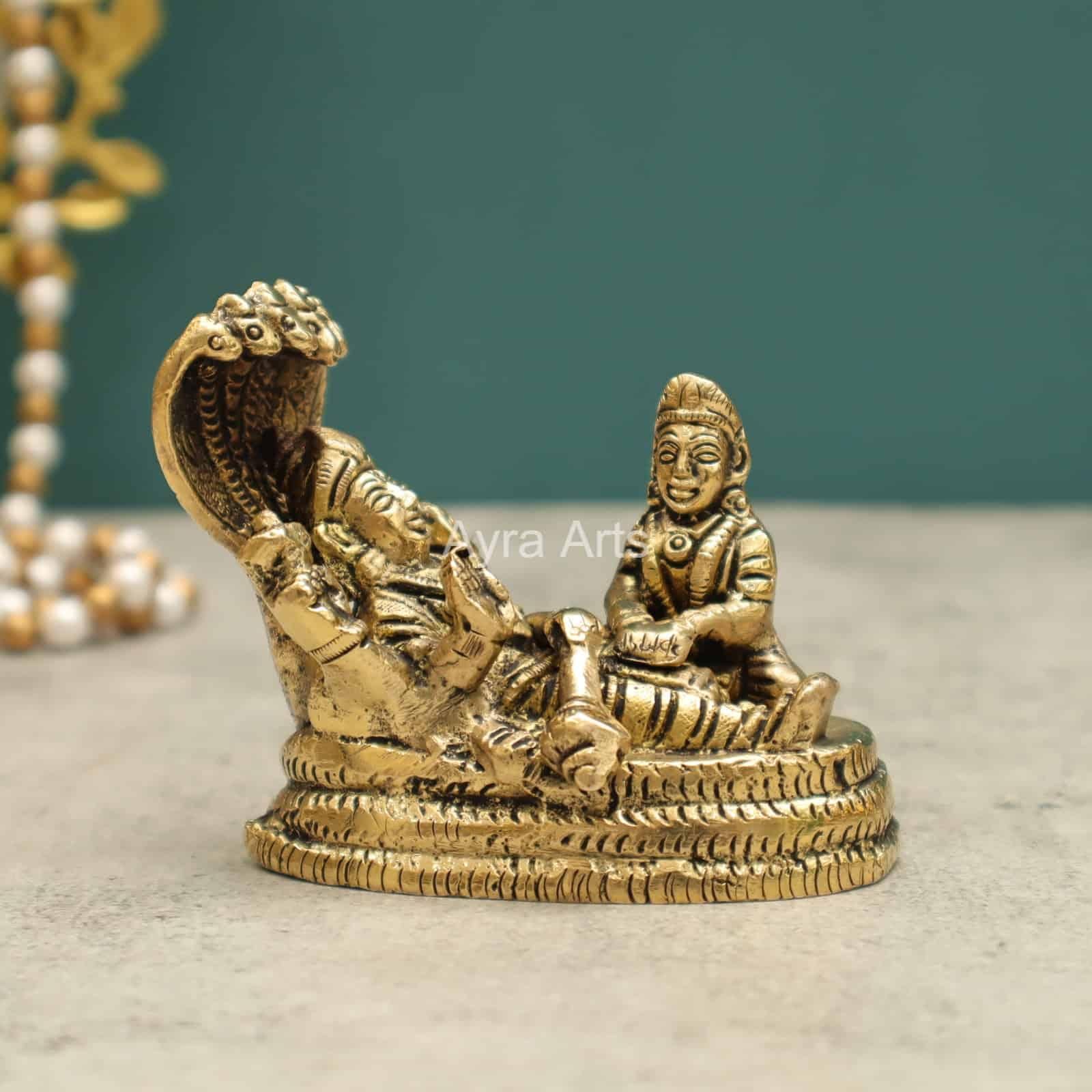 Goddess Lakshmi with Lord Vishnu Seated on Sheshnag Idol - 3 inch Height