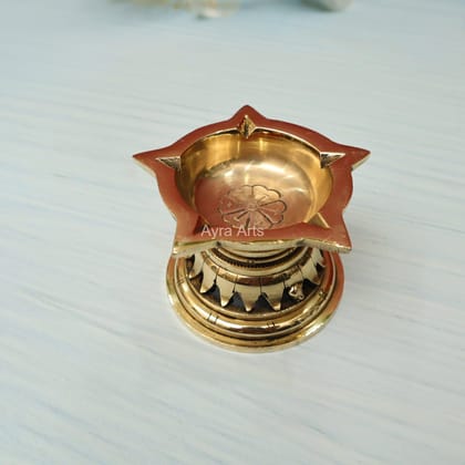 Illuminating Brass 5 Wick Panchmukha Diya - 3.2 inch Length Illuminating Brass 5 Wick Panchmukha Diya - 3.2 inch Length
