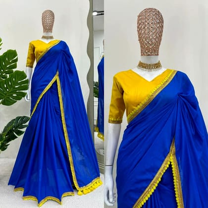 Blue Beauty Mulmul Cotton Saree with Pompoms (Color - Blue) by SHIV TEXTILES Blue Beauty Mulmul Cotton Saree with Pompoms (Color - Blue) by SHIV TEXTILES