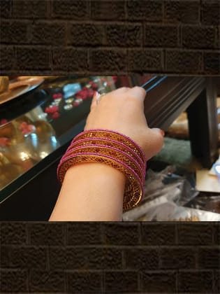 Set of four ruby bead pirohi work and side carving with ruby stones bangles-2'4