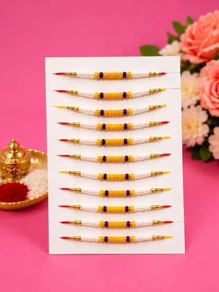 Celebrate Raksha Bandhan with this elegant set of 12 lotus design rakhis. Featuring pearl-like beads, yellow accents, and red-yellow threads for a festive traditional look.