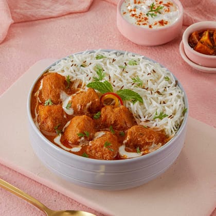 Potato In Choice Of Indian Gravy Rice Bowl.