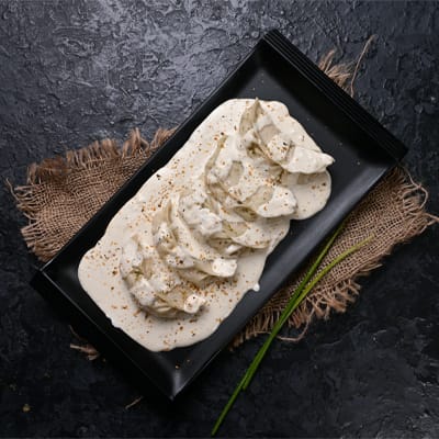 Chicken Darjeeling Momo Momo In Molten Cheesy Sauce