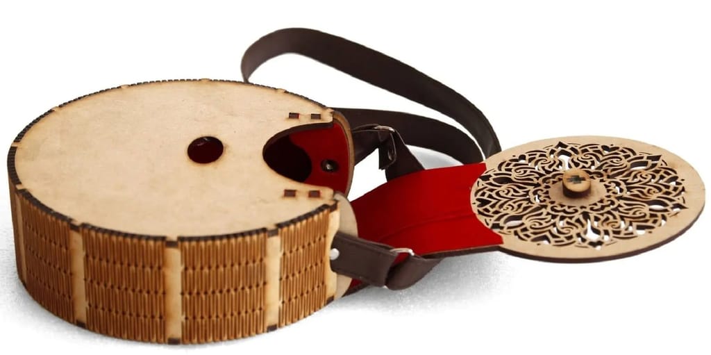 "Exquisite Handcrafted Circular Wooden Handbag with Intricate Floral Design – Perfect Rakhi Festival Gift"