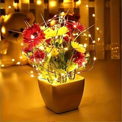 SPARKWORLD 40 LEDs 4 m Yellow Flickering, Steady String Rice Lights (Pack of 1) | Colour: Yellow (Pack of 1) SPARKWORLD 40 LEDs 4 m Yellow Flickering, Steady String Rice Lights (Pack of 1) | Colour: Yellow (Pack of 1)