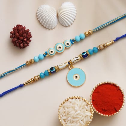 eCraftIndia Set of 2 Evil Eye Designer Rakhis with Roli Chawal Pack