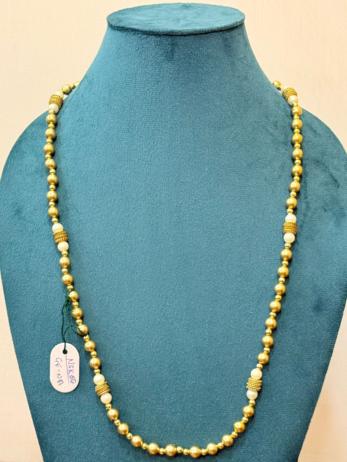 single strand golden beads necklace with white pearl contrast accents