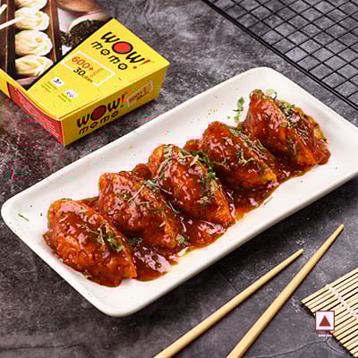 Chicken Delight Pan Fried Momo In Schezwan Sauce(Spicy)