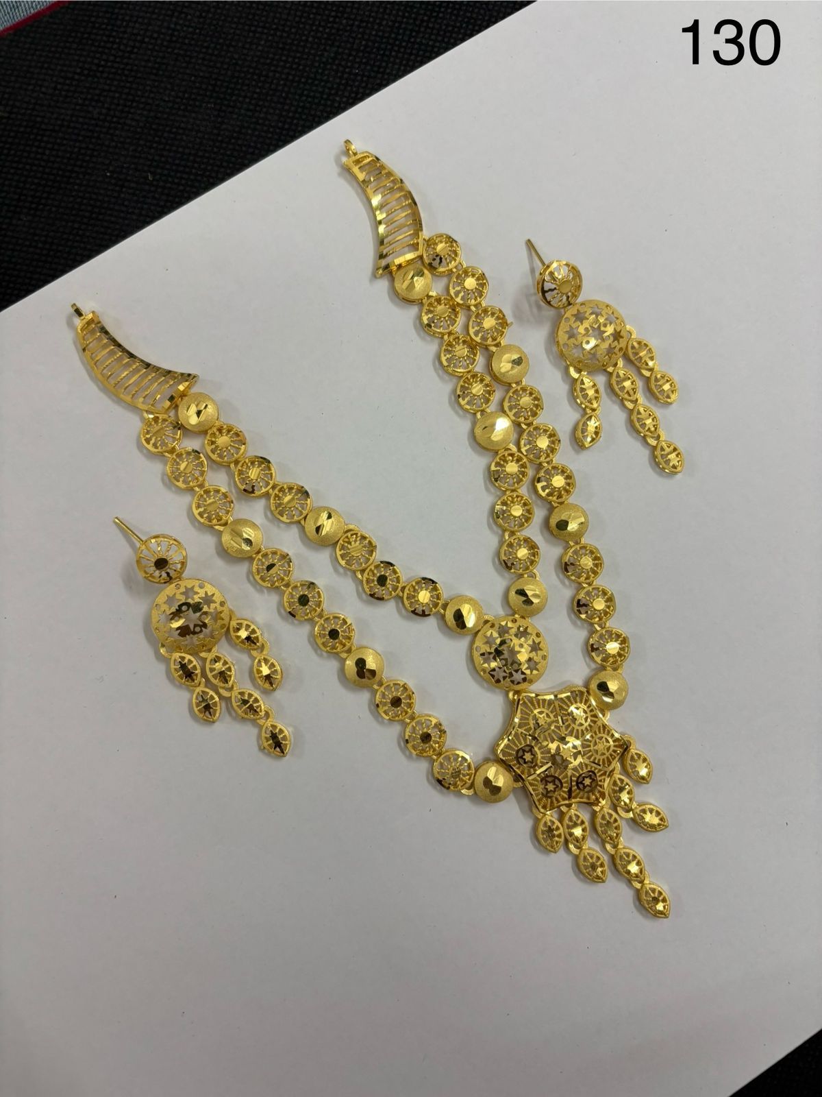 Saniya Traditional Gold-Toned Two-Layer Beaded Necklace Set with Starburst Pendant and Jhumki Drops