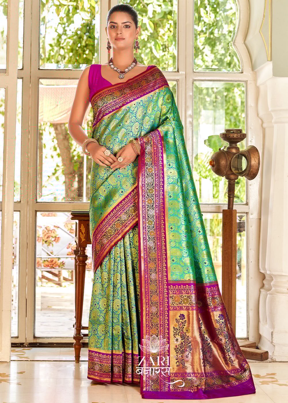 Shanti: Banarasi Brocade And Meenakar Saree In Shades Of Blue With Mughal Buta