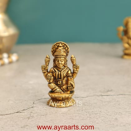 Elegant Brass Lakshmi Idol - 2 Inch Height Elegant Brass Lakshmi Idol - 2 Inch Height