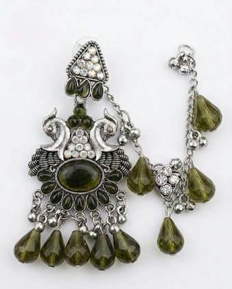 Vardaan Crystalx Exquisite oxidized silver Sahara earring featuring vibrant green crystals and intricate detailing, perfect for every women. Vardaan Crystalx Exquisite oxidized silver Sahara earring featuring vibrant green crystals and intricate detailing, perfect for every women.