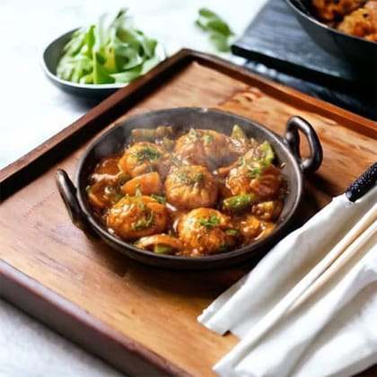 Veg Wheat Momos In Chilly Sauce
