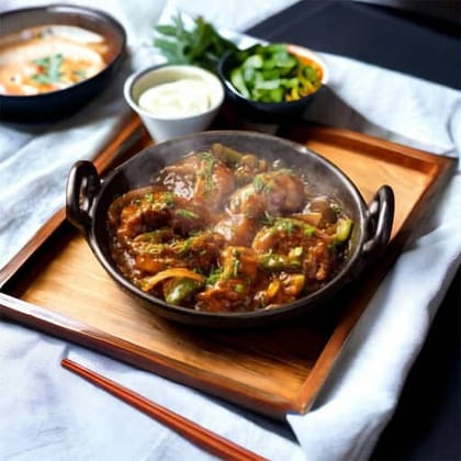 Chicken Wheat Momos In Chilly Sauce