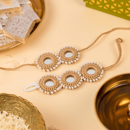 Beige Mirror Crochet Rakhi & Lumba Set-1 Rakhi + 1 Lumba Set