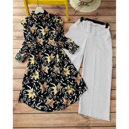 A Stylish Ensemble Featuring a Black Kurti with Palazzo by GlamaStitch-M