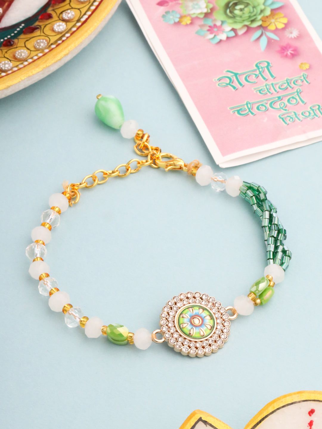 NVR Women Green Artificial Stones & Beads Floral Wraparound Rakhi with Roli Chawal Chandan & Mishri-One Size / Green