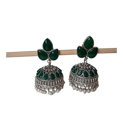Anvaya Collections Oxidized Brass Jhumka Earrings with Green & Red Gemstones and Pearl Detailing
