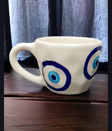 Malaikah Evil Eye Cup Pk Of 1 Abstract Ceramic Coffee Mug 300 mL ( Pack of 1 )